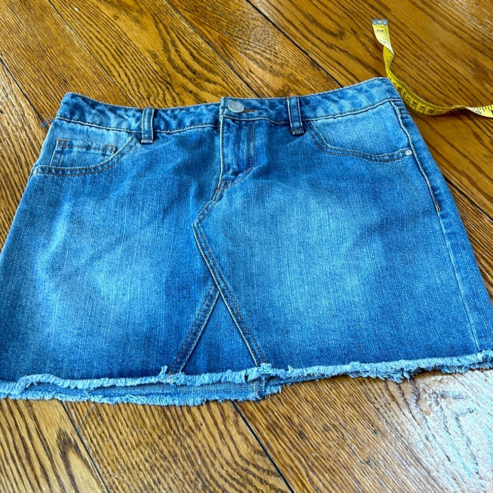 Refuge denim miniskirt. Five pocket style, lightwash.Size 4. Excellent condition